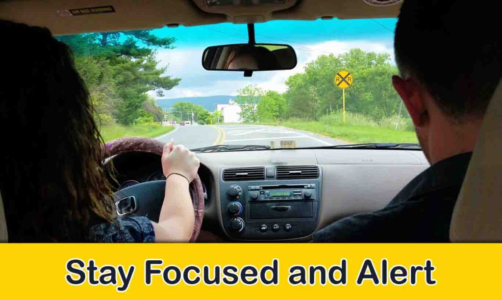 Person driving with focused attention, hands on the wheel, avoiding distractions.